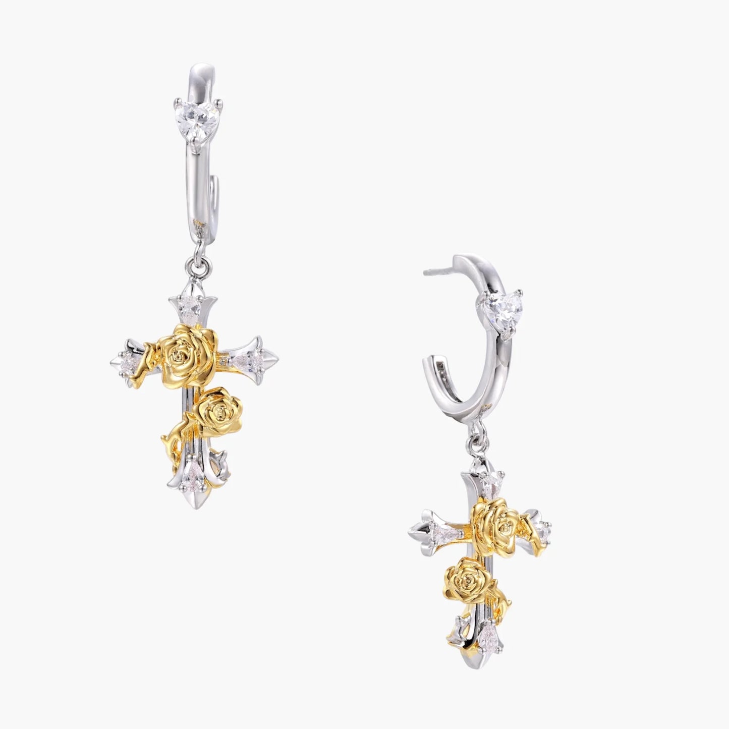 Two-tone cross earrings with gold roses and crystal stars on silver hoops, dangle drop style on white background.
