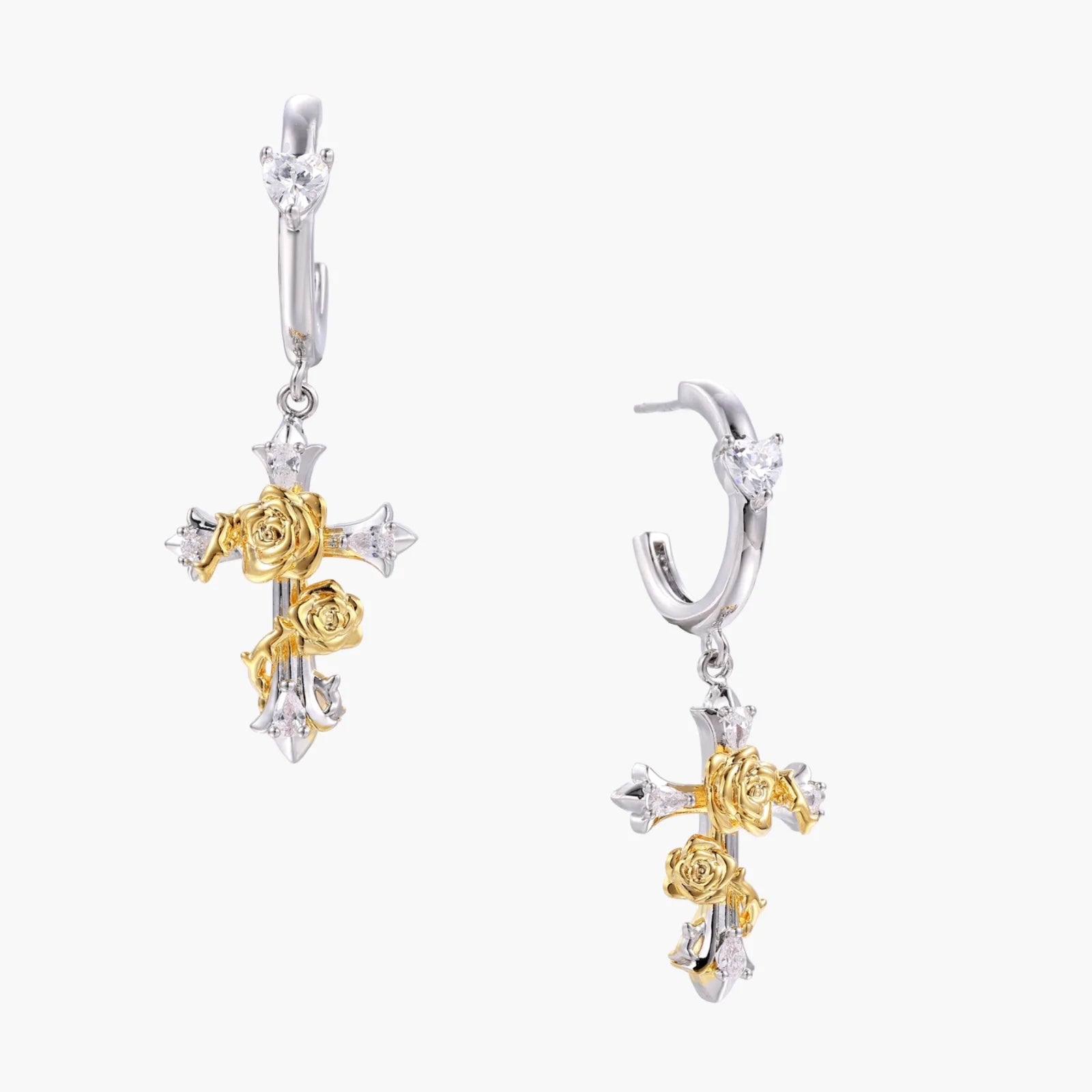 Two-tone cross earrings with gold roses and crystal stars on silver hoops, dangle drop style on white background.