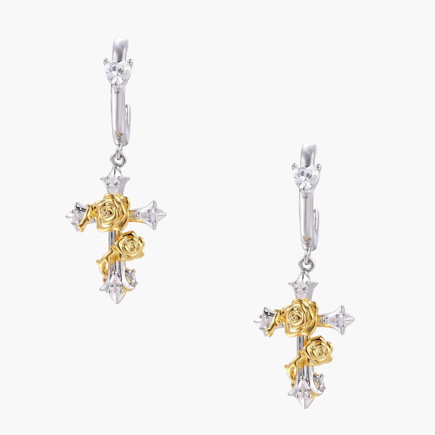 Two-tone cross earrings with gold roses and crystal stars on silver hoops, dangle drop style on white background.