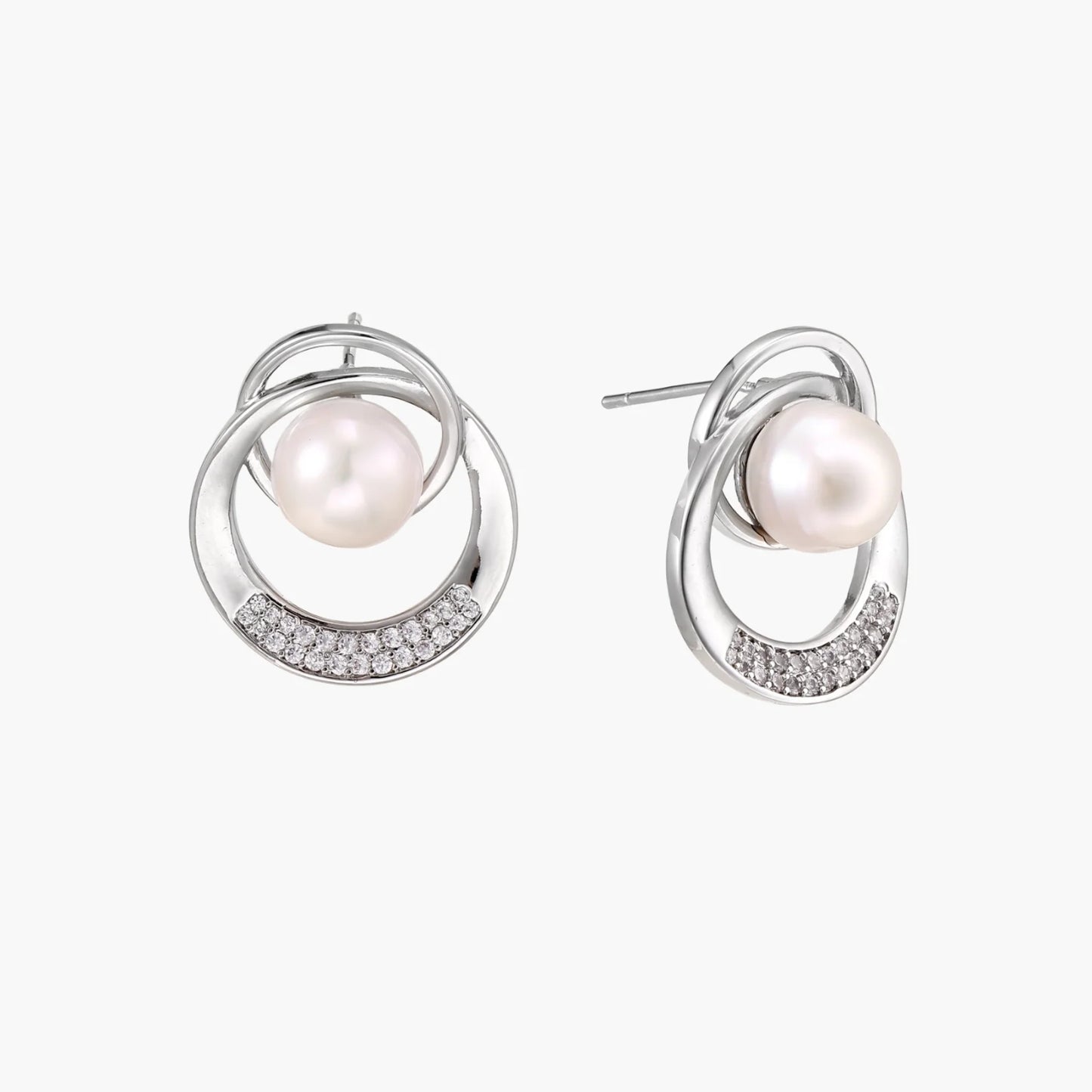 White gold-plated brass earrings with circular design, freshwater pearl center, and diamond accents