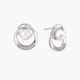 White gold-plated brass earrings with circular design, freshwater pearl center, and diamond accents