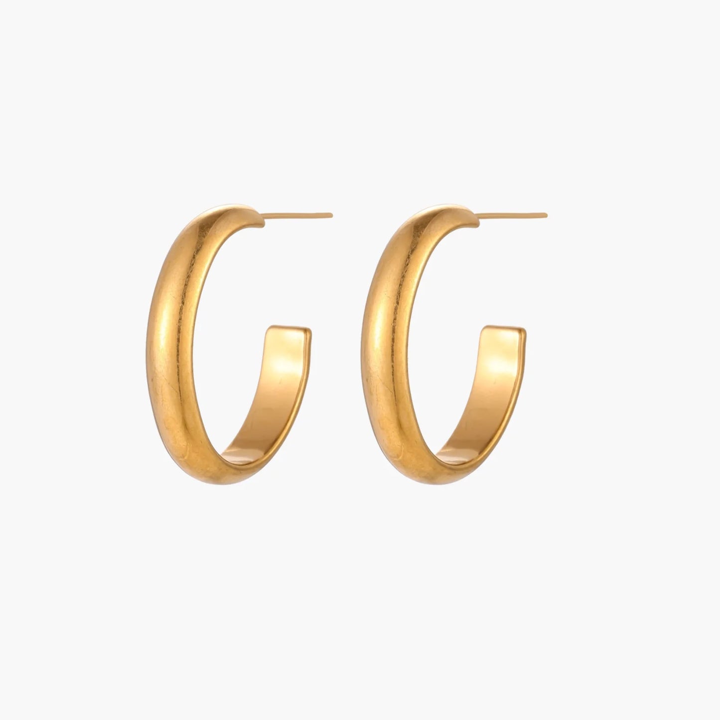 Chunky brushed gold hoop earrings in 14K plated stainless steel on cream background, front and side view.