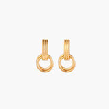 Gold stud earrings with vertical ridged bar connecting to triple interlocking circular rings on white background