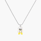 Chrome egg-shaped pendant with kawaii face, yellow bow, and pearl detail on silver chain against white background