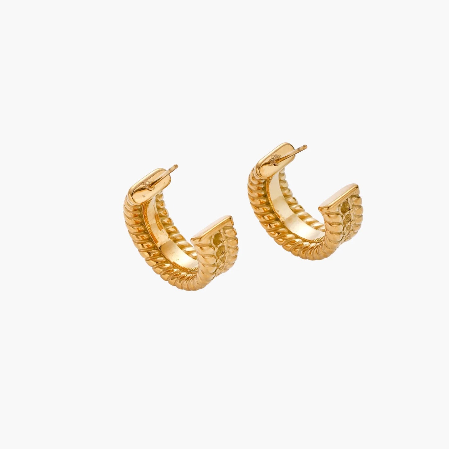 Chunky gold hoops with dimensional ridged texture and 14K plated finish shown in front and side view on cream background.