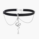 Black leather choker with white gold-plated serpent pendant adorned with zirconia crystals and teardrop charm