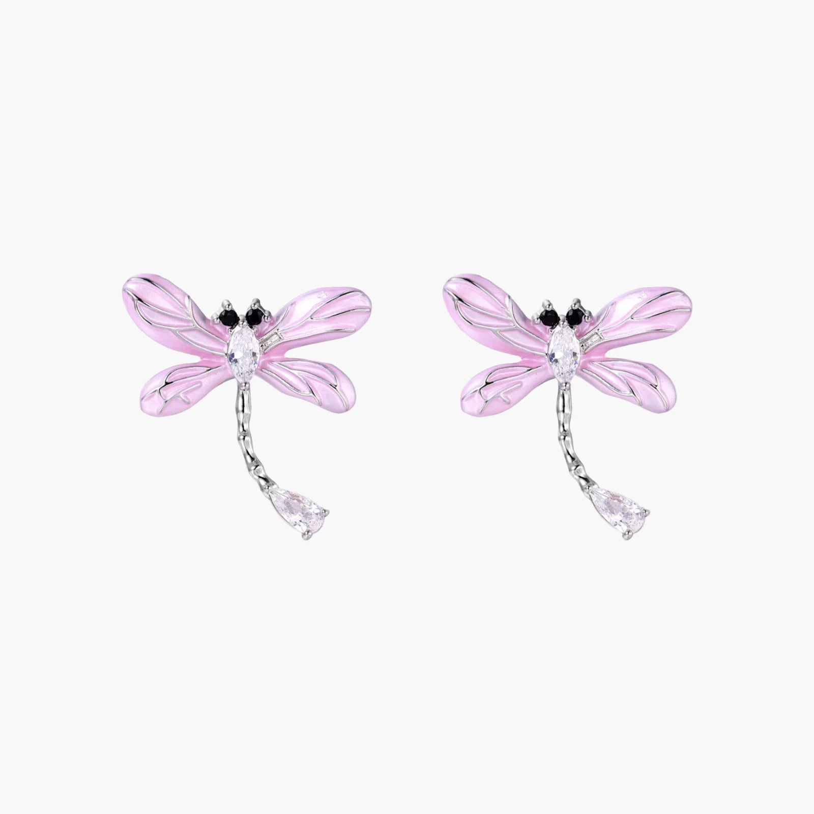 Long drop earrings with translucent lavender enamel dragonfly wings and white gold plated segmented bodies on white background