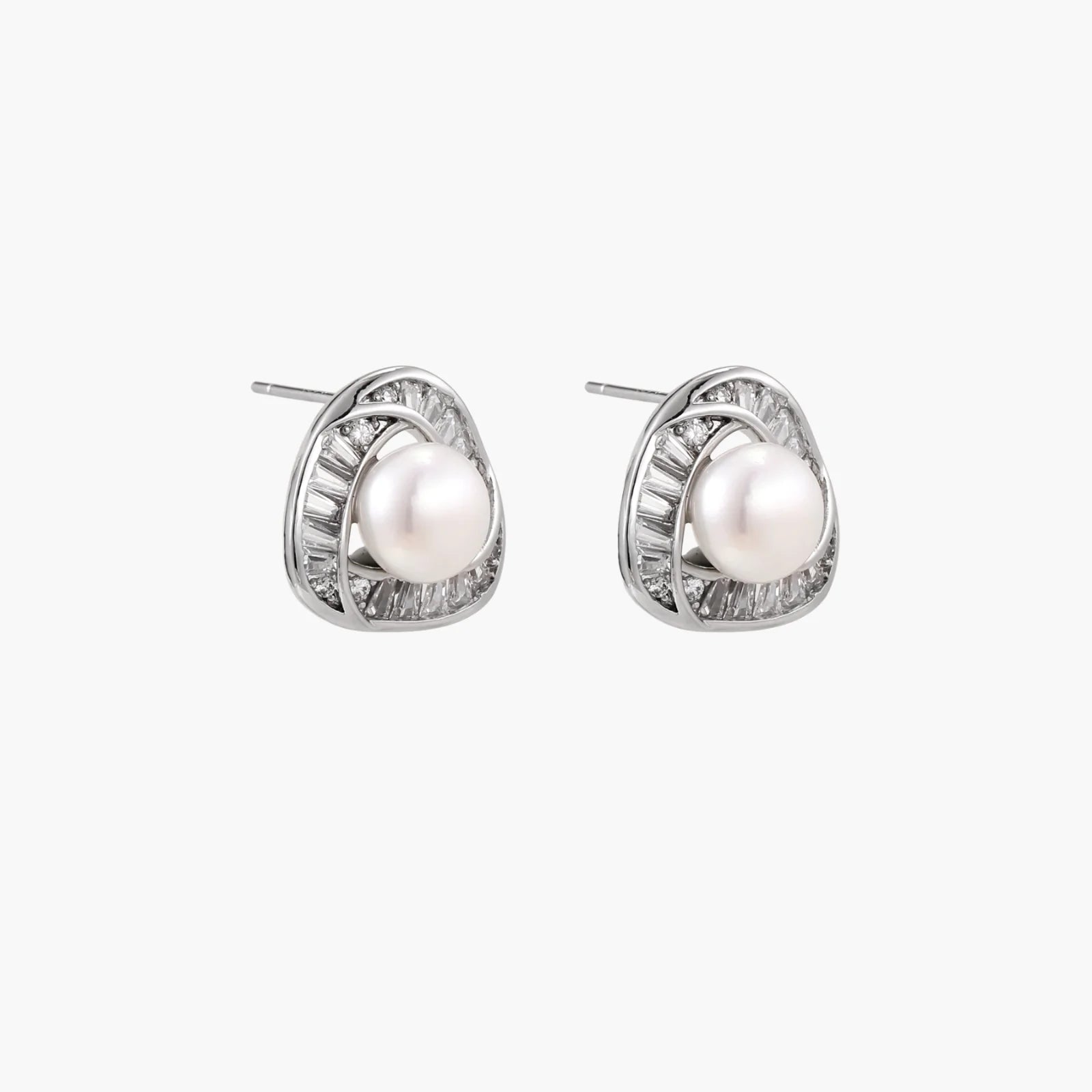 Triangular white gold plated stud earrings with central freshwater pearl and baguette-cut stones on white background