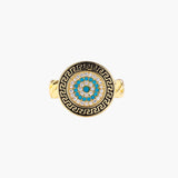 Gold chain ring with Greek key border and turquoise evil eye center on white background