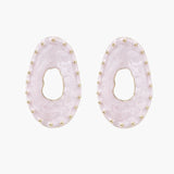 Oval lavender enamel earrings with marbled finish and gold-plated beaded border on cream background.