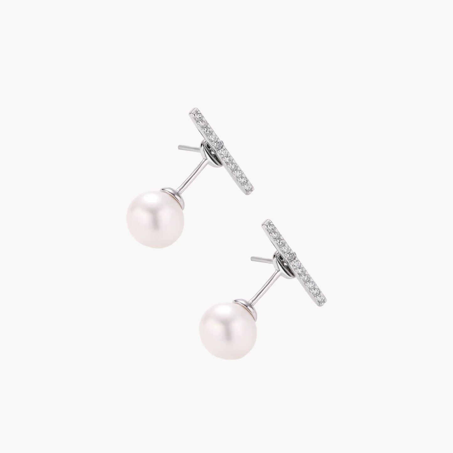 Rhodium-plated sterling silver ear jacket earrings with diamond-set horizontal bar and freshwater pearl drop