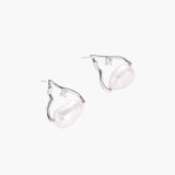 Silver mountain outline studs with baroque pearl and diamond accent on white background