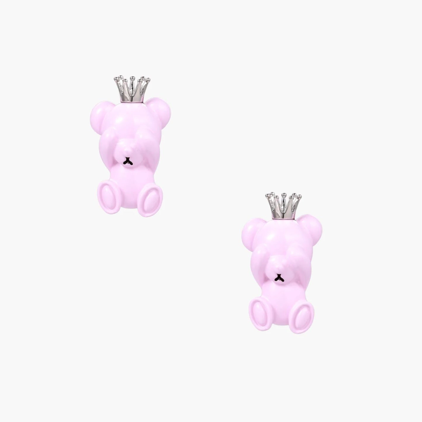 Lavender pink teddy bear earrings with silver crowns, white gold plated brass, viewed from back on cream background