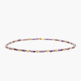 Delicate 18K gold vermeil necklace with alternating lavender zirconia beads and white freshwater pearls on cream background