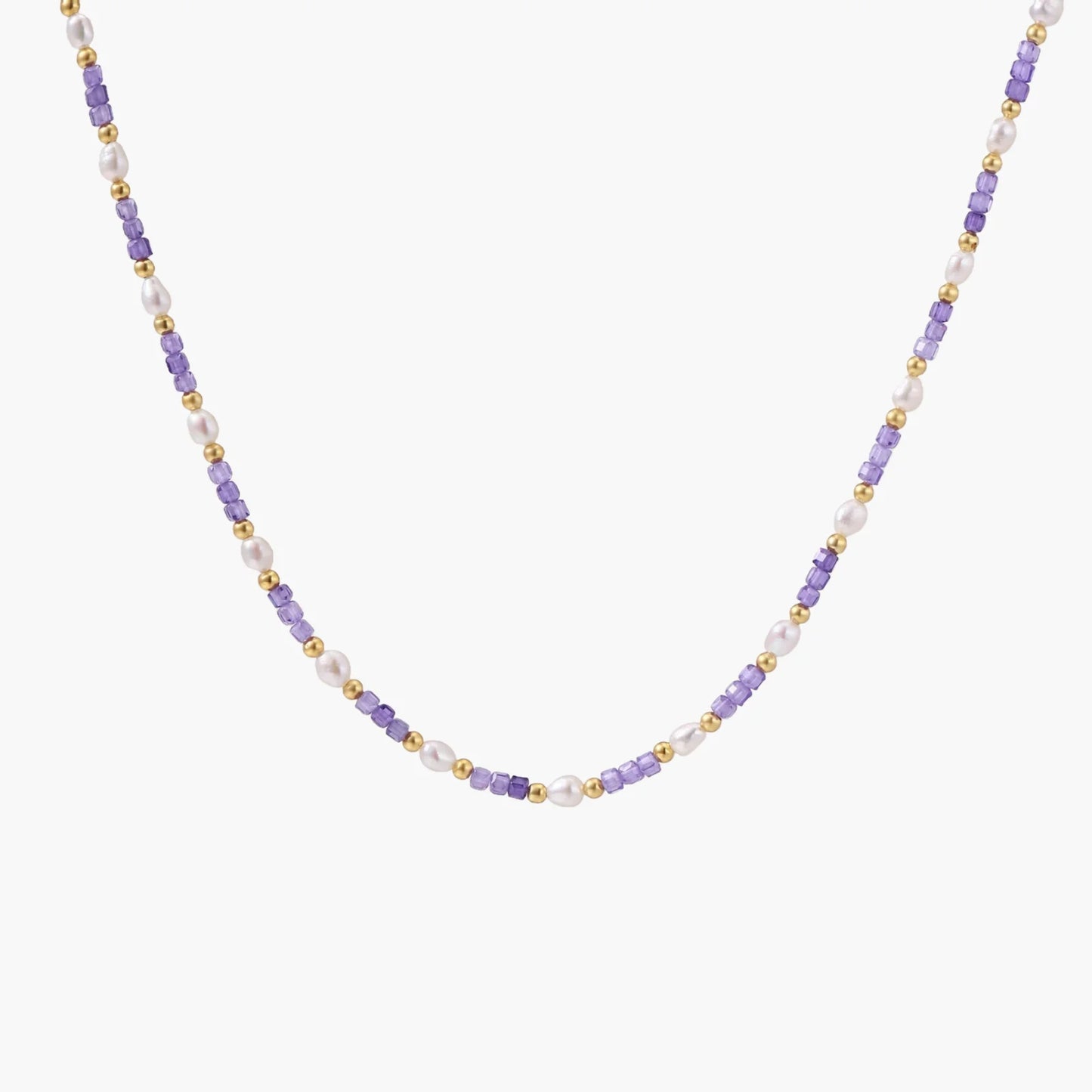 Delicate 18K gold vermeil necklace with alternating lavender zirconia beads and white freshwater pearls on cream background