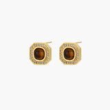 Gold-plated octagonal stud earrings with brown tiger's eye centers and cubic zirconia border on cream background.