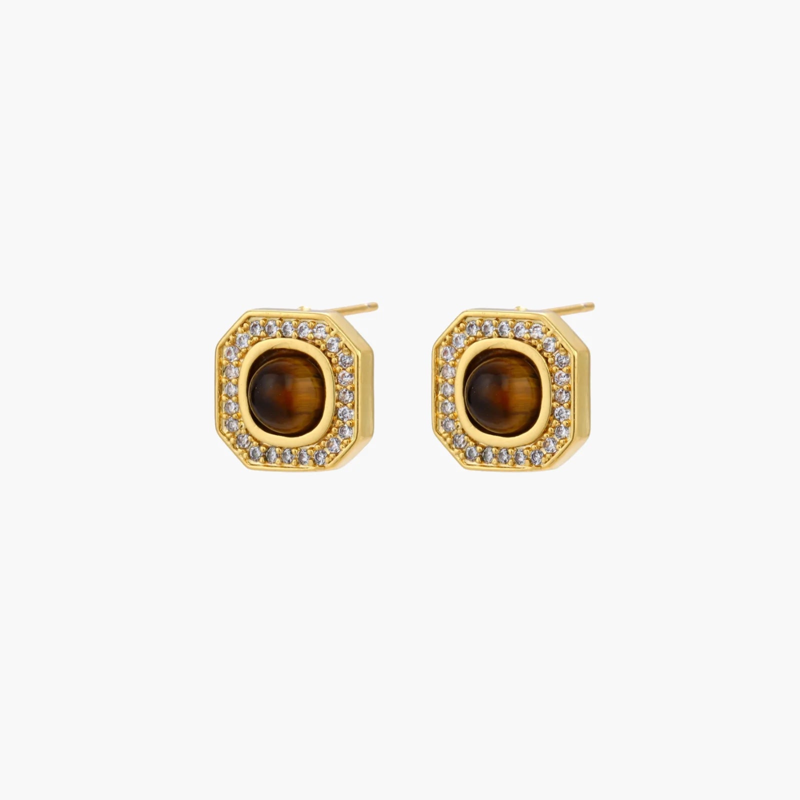 Gold-plated octagonal stud earrings with brown tiger's eye centers and cubic zirconia border on cream background.